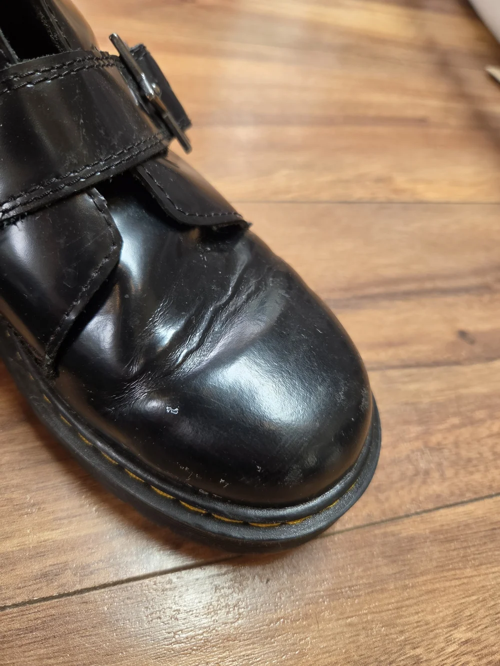 Dr. Martens Kids Black Leather Star Buckle Ankle Boots
